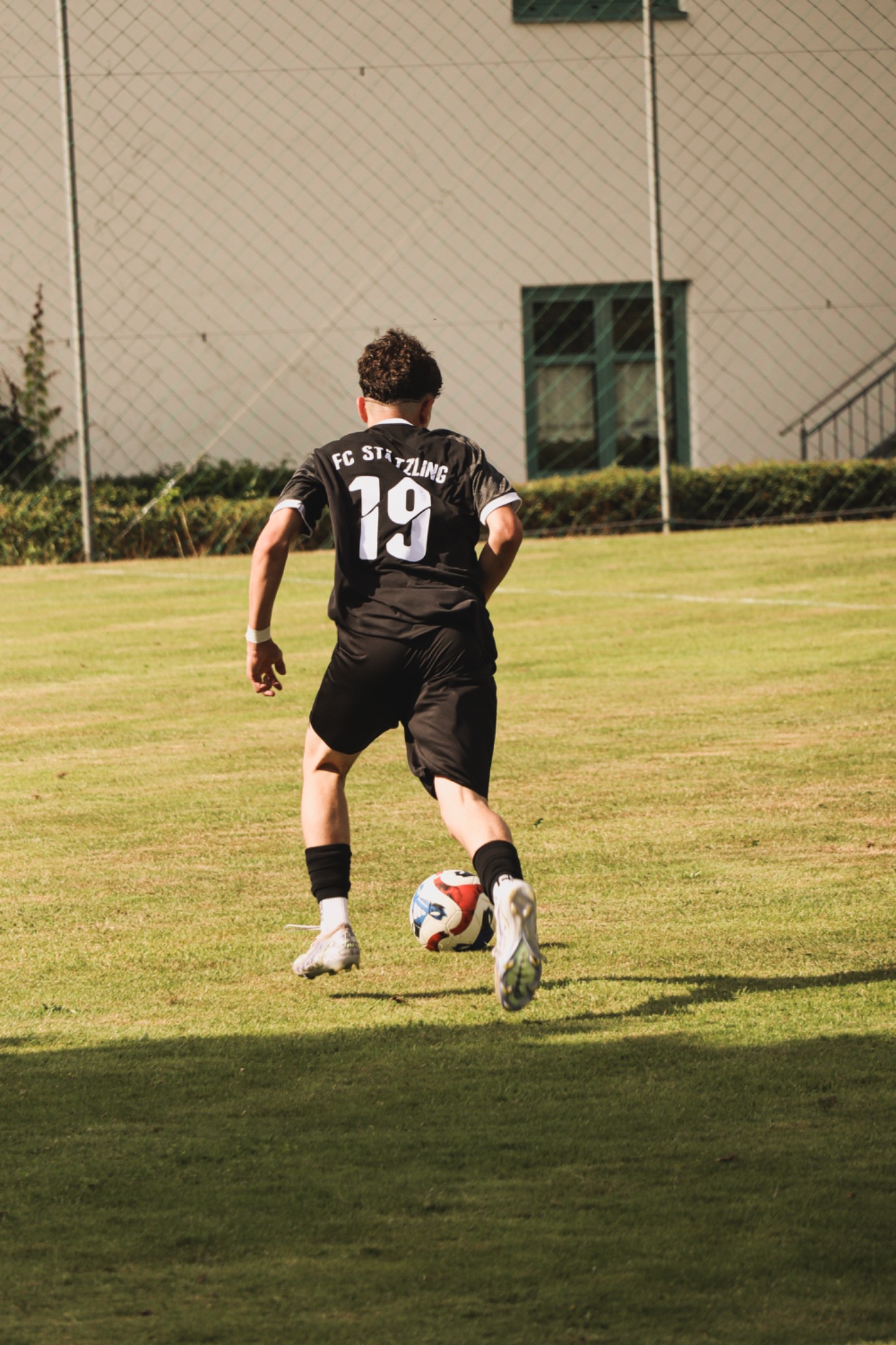 Fußballspieler mit Rückennummer 19